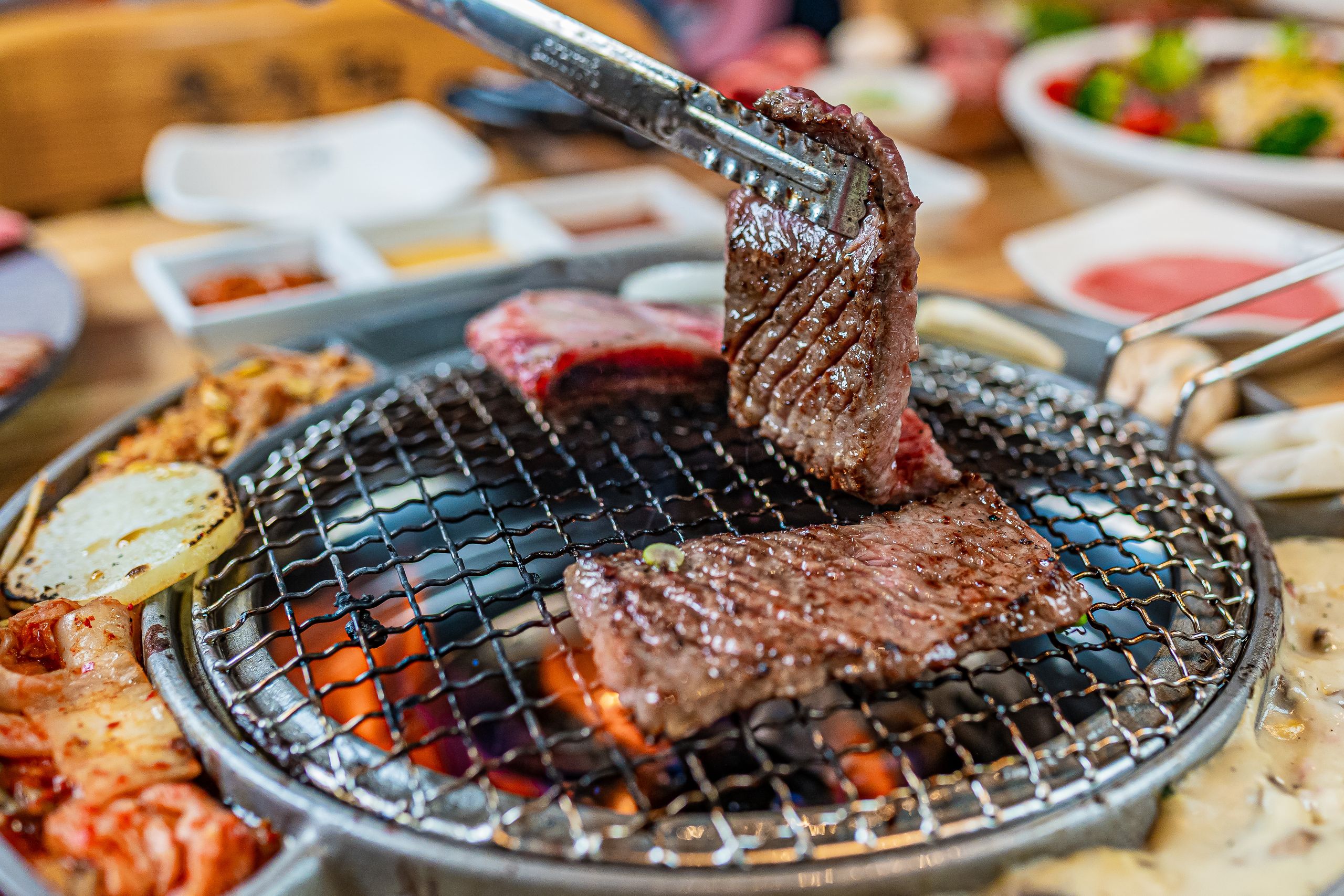 Korean BBQ at Home: My Exact Shopping List (Meat, Marinade & Grill Pan) 1 Korean BBQ at home shopping list - marinated beef, ssamjang and grill pan on table