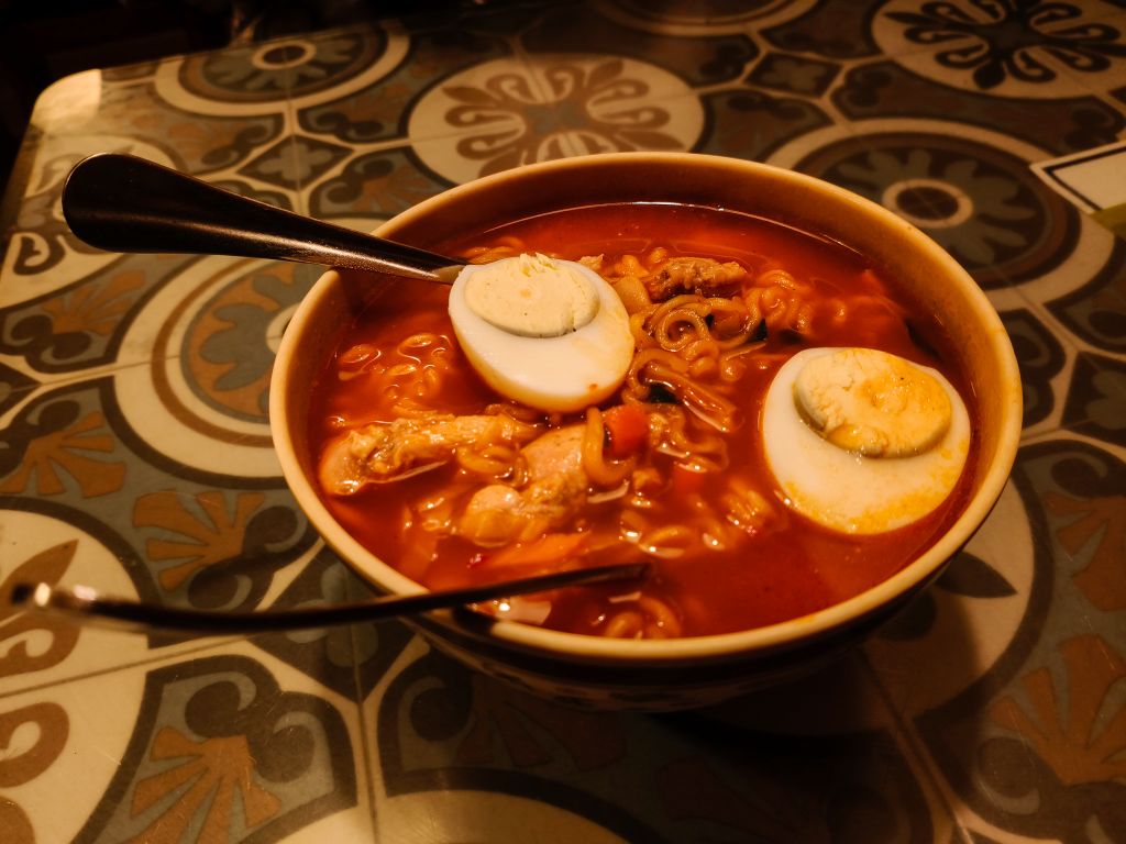 4 Korean Convenience Store Combos to Make at Home (Banana Latte, Cheese Rabokki & More) 3 Cheese rabokki made with cup ramen and tteokbokki in bowl